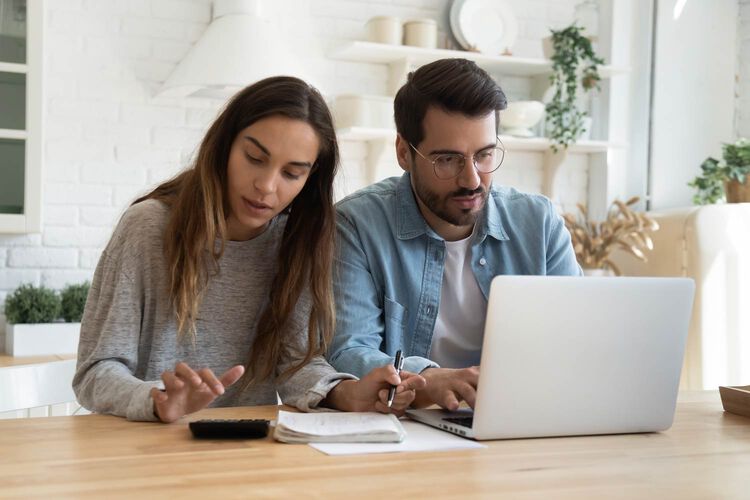 man and woman on computer