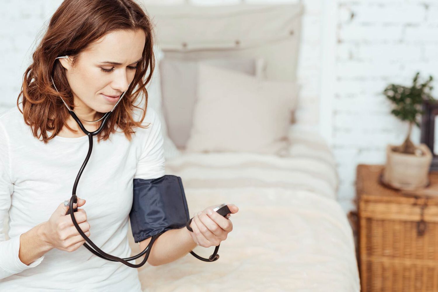person taking their blood pressure
